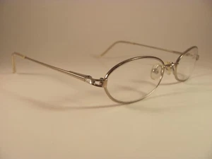 Monturas de gafas RX de borde completo doradas y estrás First Issue FI16 52-18-135 para mujer - Imagen 1 de 8