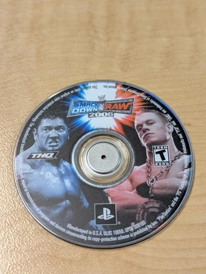 WWE Smackdown Vs Raw 2007 - PSP -- SOLO DISCO, sin manual/estuche Foto 1 de 3