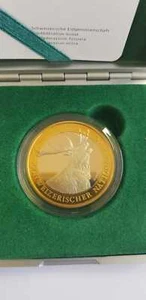Moneda conmemorativa bimetálica de 10 francos de Suiza 2009 Red Deer Park con caja de certificado de autenticidad  - Imagen 1 de 6
