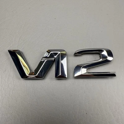 Mercedes Benz 600 SL V12 1993 guardabarros inferior delantero emblema insignia logotipo cromo OEM Foto 1 de 4