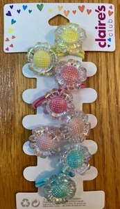 Claire’s Set of 4 daisy pony tail holders~light pink~dark pink~green~yellow NWT - Picture 1 of 3