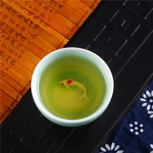 Taza de té de porcelana relieve de pescado taza de té taza de té china tazas de cerámica creativa - Imagen 1 de 12