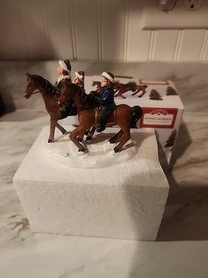 Figuerina de caballos de montar de Navidad de vacaciones Foto 1 de 4