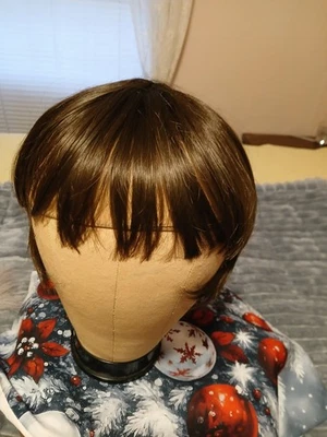 Clip de flecos marrón Foto 1 de 2