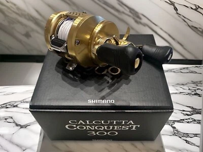 Carrete Shimano 18 Calcutta Conquest 300 engranaje derecho 6,2:1 con CAJA JPN Foto 1 de 4