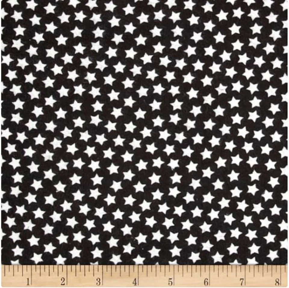 BTY Magic White Star Glow In The Dark Black Cotton Flannel Fabric By The Yard - Image 1 of 1