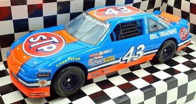 Ertl 1/18 Scale Diecast 7582 - Pontiac NASCAR 7&7 STP #43 Earnhardt/Petty - Image 1 of 4