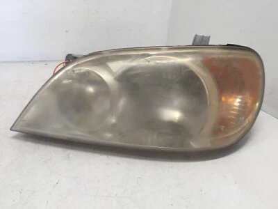 Faro halógeno dañado lado del conductor izquierdo Kia Sedona 2002-2005 0K52Y-1040A OEM Foto 1 de 4