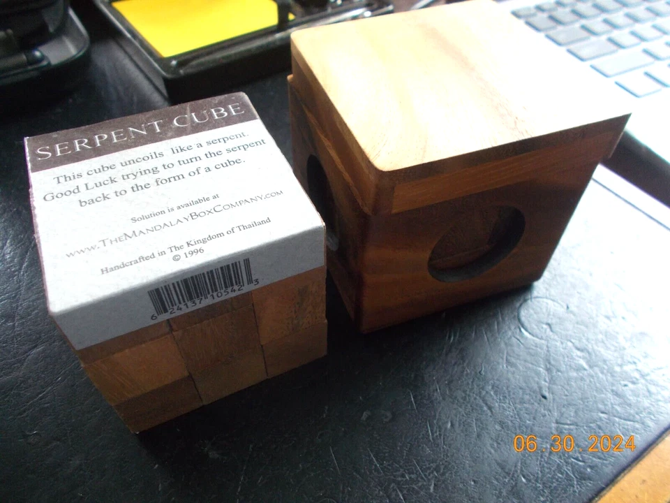 2 Wooden Cube Puzzles: Serpent Cube (new) and Puzzle inside a Box, see photos - Image 1 of 4