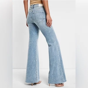 Jeans UEC Express anni 70 svasati elasticizzati orlo grezzo lavaggio chiaro denim blu TG 10 - Foto 1 di 10