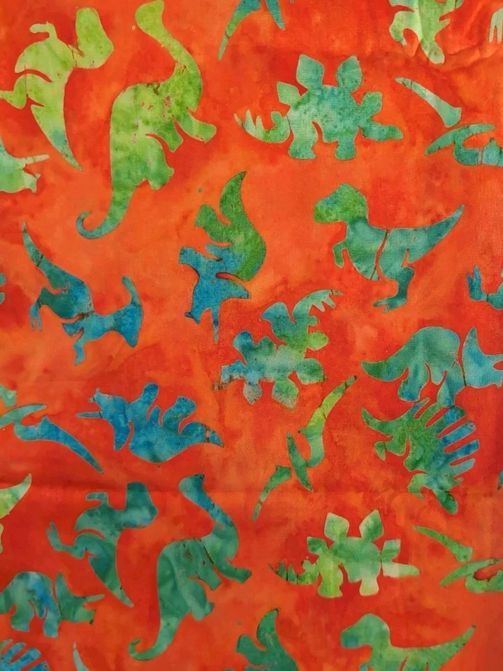 ¡DINOSAURIOS! Algodón batik azul verde sobre naranja por yarda Foto 1 de 1