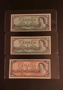 LOT OF 3 LOW SERIAL NUMBER 1954 Bank of Canada $1 & $2 Banknotes. CIRCULATED. - Picture 1 of 2