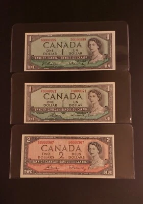 LOT OF 3 LOW SERIAL NUMBER 1954 Bank of Canada $1 & $2 Banknotes. CIRCULATED. - Image 1 of 2