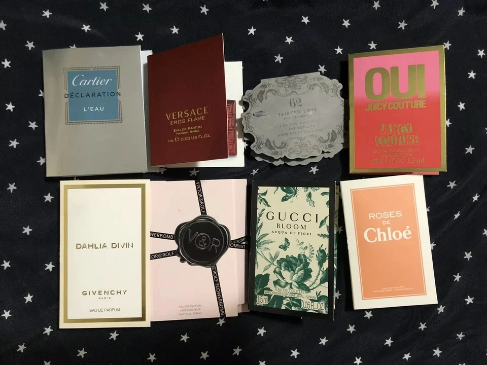 Lote de 8 muestras de perfumes de diseñador Versace, Gucci, Chloe, Givenchy, Cartier Foto 1 de 1
