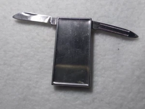 Fermasoldi vintage con piccolo coltello e lima per unghie acciaio inox da Hong Kong - Foto 1 di 5