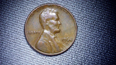 1968 D Lincoln Penny with Error on Top Rim, and "L" in Liberty on Edge Cover