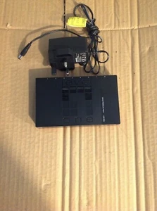 LevelOne FSW-0811 network switch + AC Adapter - Picture 1 of 6