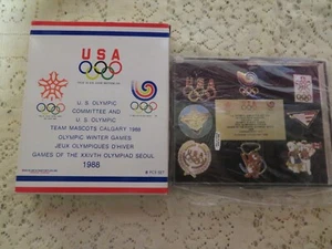 NIB RARE COMMEMORATIVE SET 1988 OLYMPAID OLYMPICS WINTER GAMES 8 PIN BACKS - Picture 1 of 3