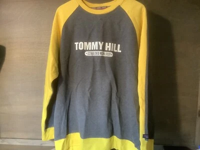 SUDADERA TOMMY HILLFIGER PARA HOMBRE GRIS AMARILLO TALLA GRANDE MANGA LARGA USADA EN EXCELENTE ESTADO  Foto 1 de 4