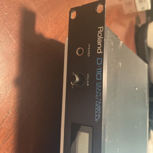 A Roland D-110 Multi-Timbral sound module, with manual
