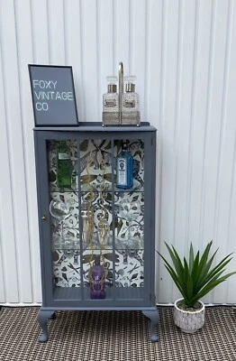 Grey cocktail drinks display cabinet Emma shipley extinct print  - Image 1 of 4