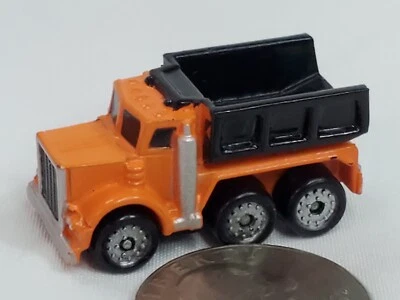 Винтажный оранжевый строительный самосвал Galoob Micro Machines - Изображение 1 из 4