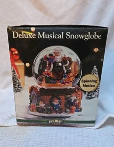 Snow Globe Musical Spinning Santa's Workshop We Wish You a Merry Christmas New! - Picture 1 of 6