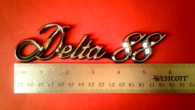 NUEVO 1977-1978-1979-1980-1981 Oldsmobile Delta 88 guardabarros-cuarto panel emblema Foto 1 de 4