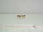 WEDDING BAND WITH 10 CHANNEL SET DIAMONDS SET IN 10K YELLOW GOLD SZ 7.25 RG42-N
