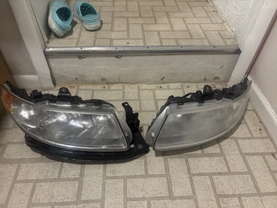 Par de faros Saab 92x 2005-2006 HID usados OEM Foto 1 de 4