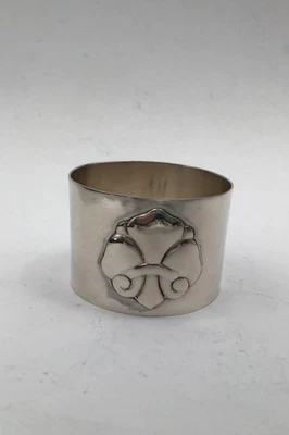 Anillo servilleta de plata con lirio francés de trabajo danés (1920) Foto 1 de 4