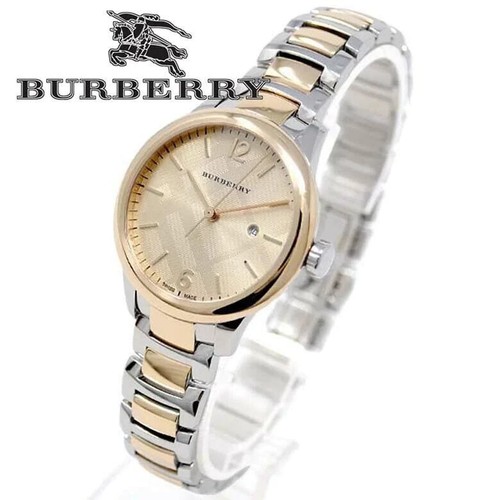 Montre Femme Authentique BURBERRY MADE SUISSE Argentée et Or Date. 519 00€ NEUVE