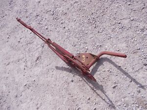 Farmall IH Cub tractor rear spring loaded implement hand lift