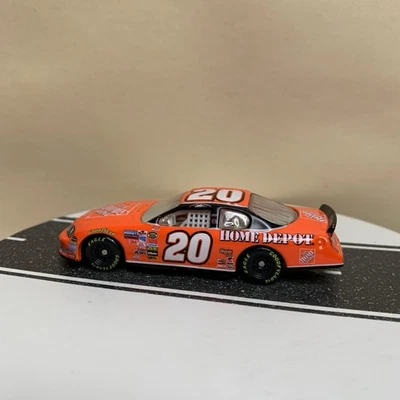 Motorsports Authentics Tony Stewart #20 Home Depot Chevy Monte Carlo Orange 1:64 - Image 1 of 4