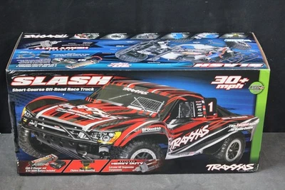 TRAXXAS 58234-8 SLASH 2WD BRUSHED SCT  w/2970 Charger 335 - Image 1 of 4