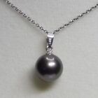 deep brown pearl pendant marked G18K on silver chain marked 925