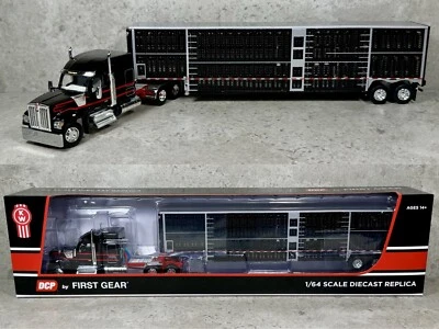 1/64 Kenworth W990 w/ Tandem Axle Wilson Livestock Trailer Black/Red DCP - Image 1 of 4
