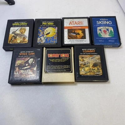 Lote de 7 carros de juegos Atari solamente (Pac-man, Donkey Kong, esquí, etc.)- Sin probar Foto 1 de 4