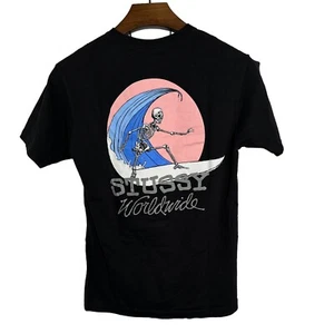 Camiseta De Colección Stussy Worldwide Negra Bolsillo Esqueleto Surfer Talla Mediana - Imagen 1 de 7