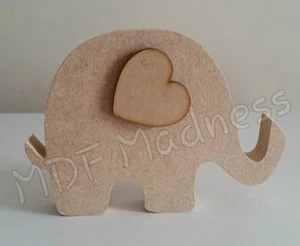 MDF FORMA ARTESANAL. ELEFANTE DE MADERA CON OREJA DE CORAZÓN - Imagen 1 de 1