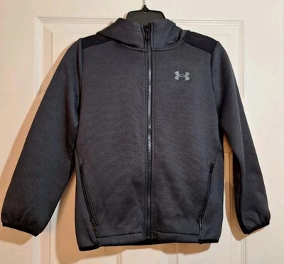 Chaqueta negra Under Armour juvenil talla pequeña con bolsillos Foto 1 de 3