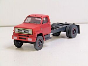 dcp/greenlight red weathered Chevy C70 cab&chassis new no box 1/64/.