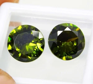 Par de piedras preciosas de corte redondo de circón verde camboyano natural de 8,55 quilates de primera calidad - Imagen 1 de 12