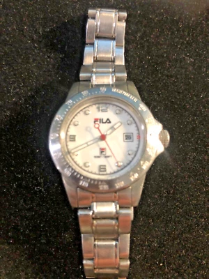 Reloj FILA VINTAGE Mujer Acero Inoxidable Taquímetro Fecha Resistente al Agua BATERÍA NUEVA Foto 1 de 4