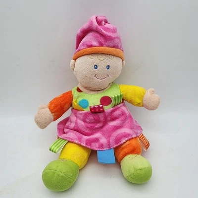 Taggies Mary Meyer Bebé Muñeca Peluche 11” Multicolor Vestido Rosa Sombrero Relleno Lovey Foto 1 de 4