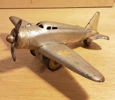 Vintage 1930s Wyandotte type Pressed Steel Single Engine Airplane Silver 6" wing - Image 1 of 4