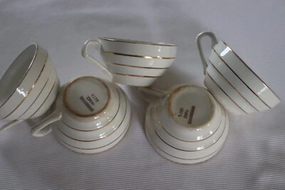 ancienne tasse Sarregueminesen faience  blanc cassé et dorure - Photo 1/2