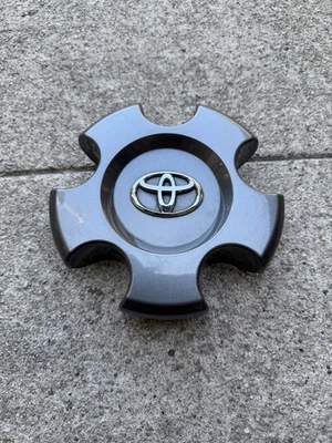Tapacubos central de rueda de carbón Toyota Tundra 2018-2020 2021 2022 OEM 4260B-0C050 Foto 1 de 2