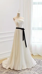 Aga - belted strapless A-line wedding dress. - Picture 1 of 7