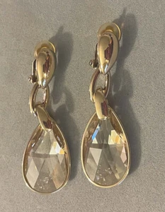Pendientes colgantes grandes firmados por SWAROVSKI con clip de cristal color champán - Imagen 1 de 6